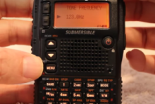 Hand held radio showing tone setting